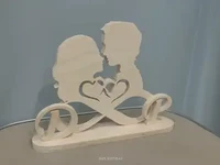 Статуэтка влюбленной пары с инициалами